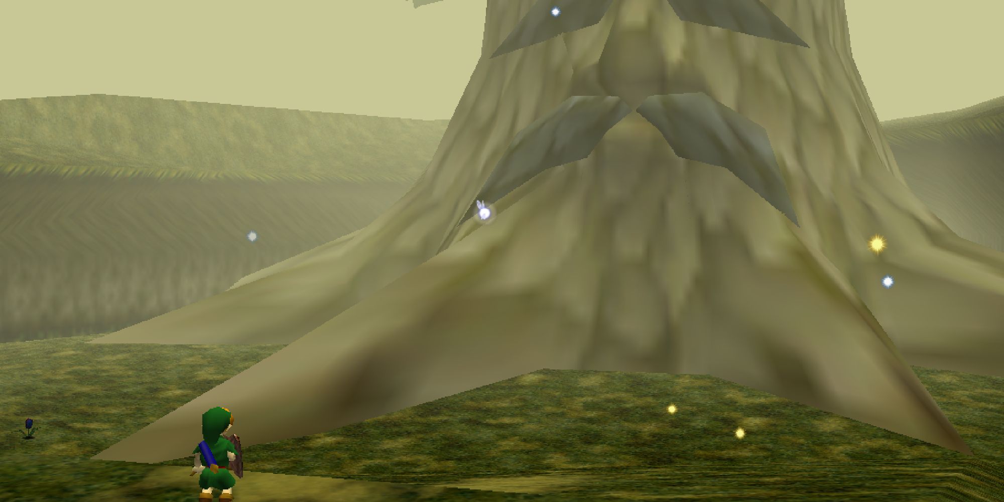 Young Link standing in front of the Great Deku Tree in OOT