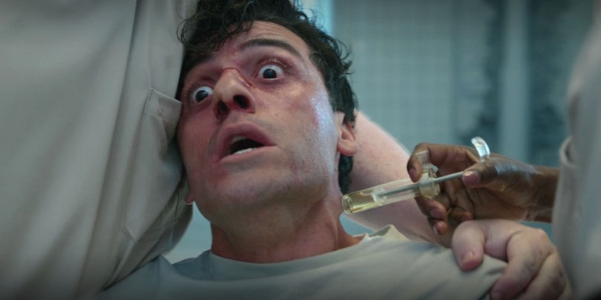 Oscar Isaac Marc Spector getting sedated with syringe Moon Knight