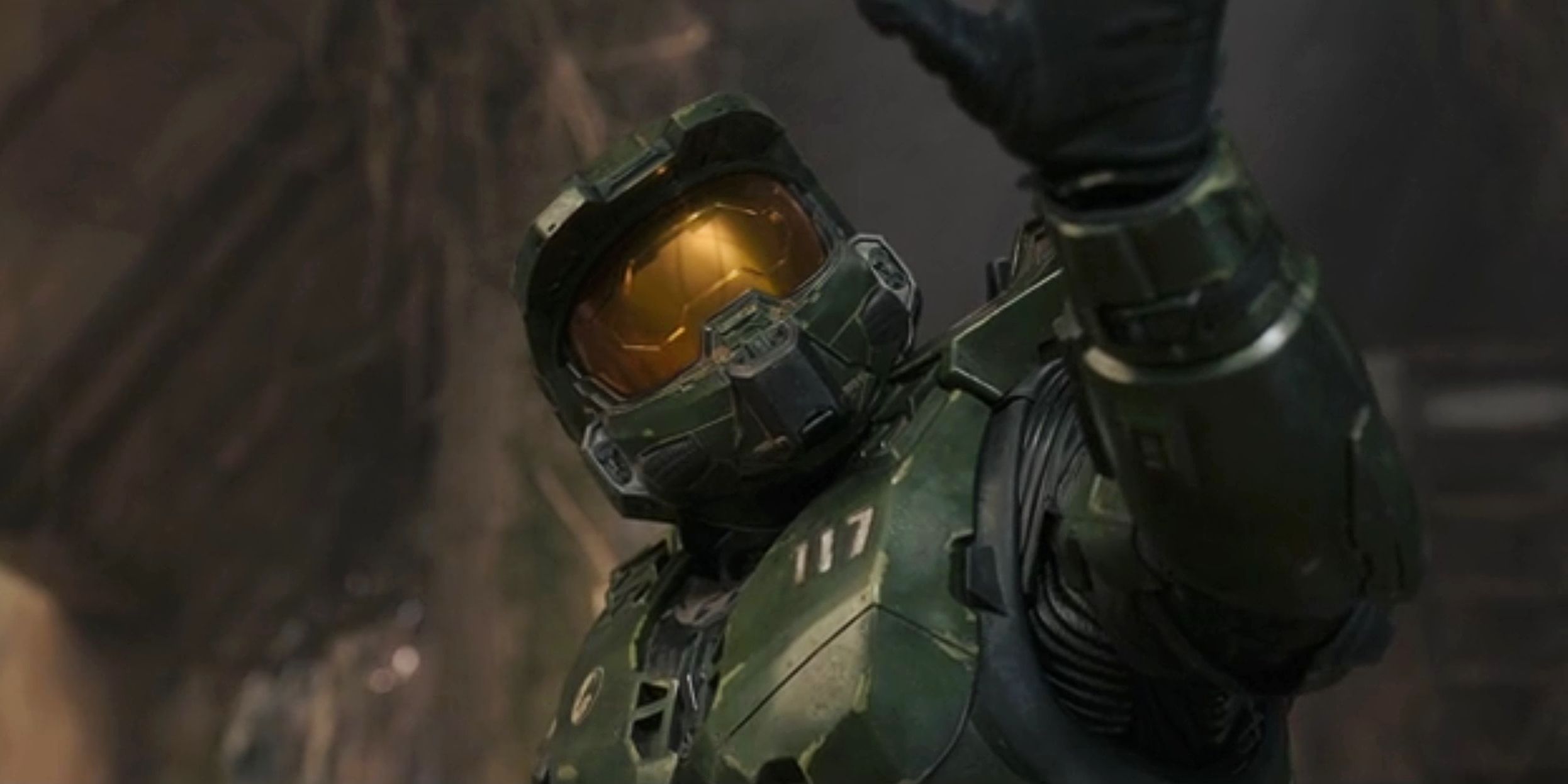 Master Chief reaching out in Halo series