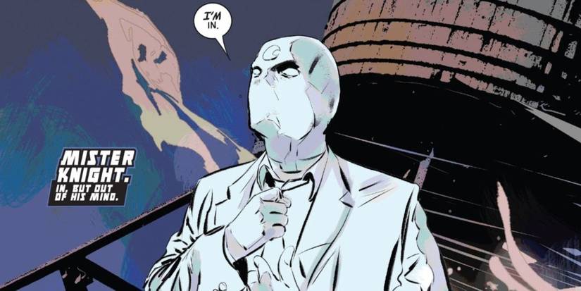 Mr. Knight straightening his tie Cropped