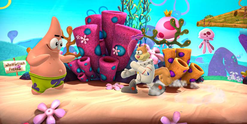 Patrick Star and Sandy fighting on a SpongeBob SquarePants stage in Nickelodeon All-Star Brawl