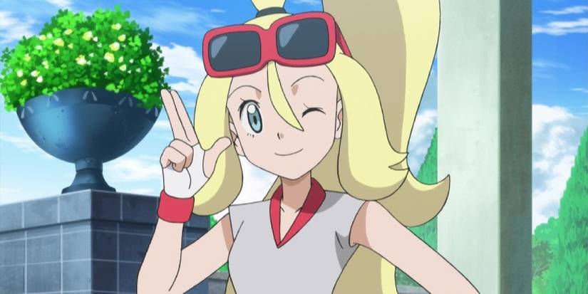 Korrina wearing sunglasses and winking at the camera