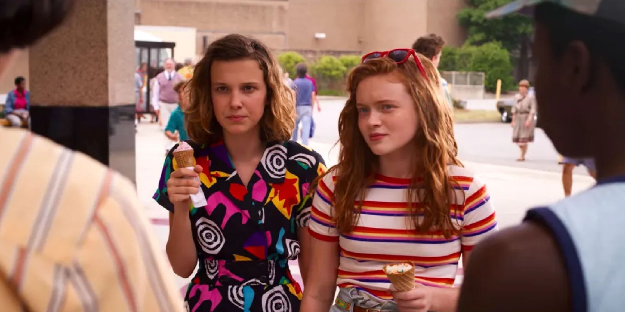 Eleven and Max with ice cream confronting Mike and Lucas at the mall in season 3