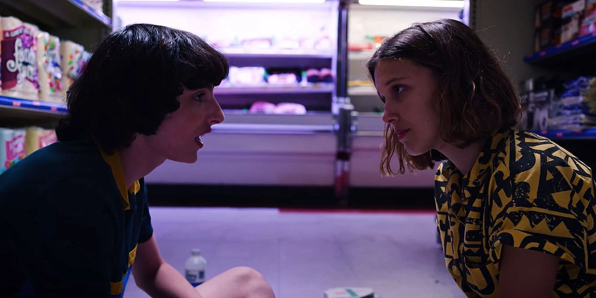 Mike apologizing to Eleven on the floor of a convenience store in season 3