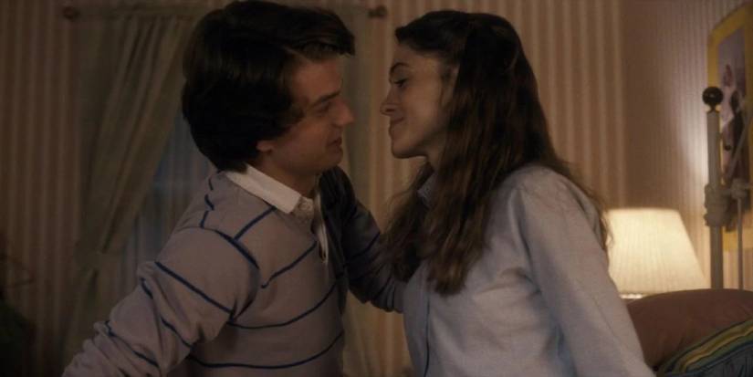 Nancy and Steve about to make out in the first episode of Stranger Things