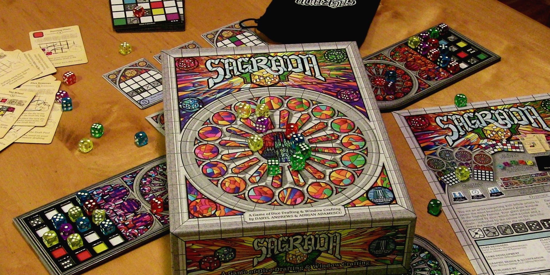 Sagrada is a die stacking board game with semi sheer dice set