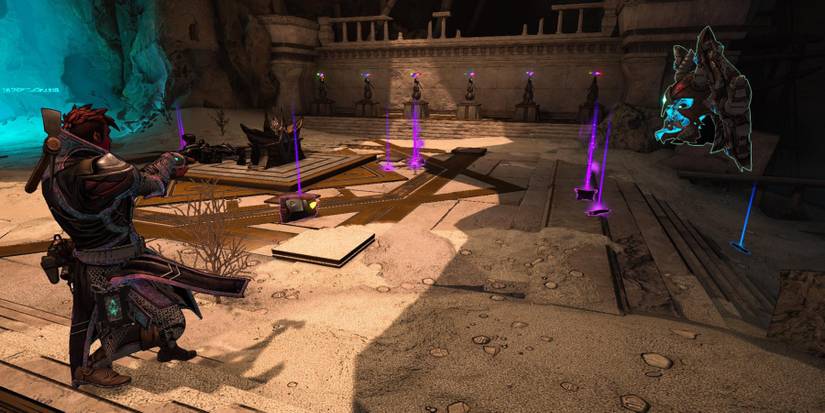 a player character staring at piles of loot scattered around a stony room with rabbit statues along the far wall