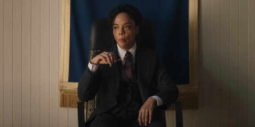 Valkyrie sitting in a chair in New Asgard from the Thor Love & Thunder trailer