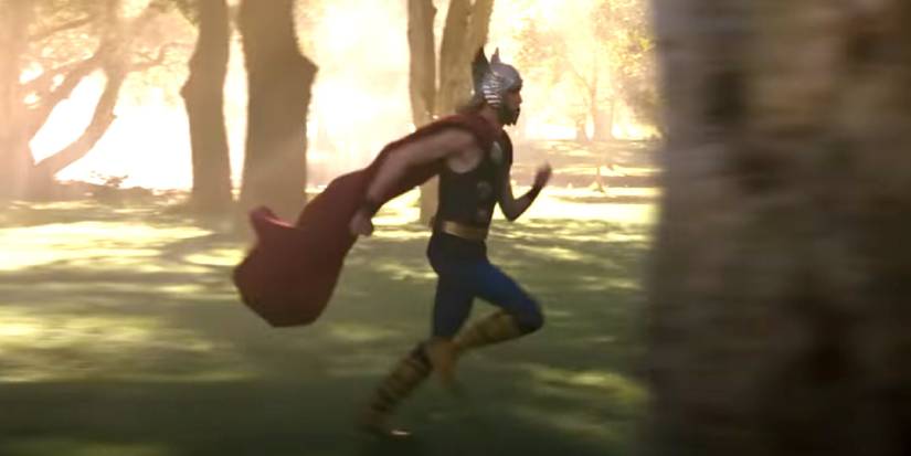 A teenage Thor running through the woods