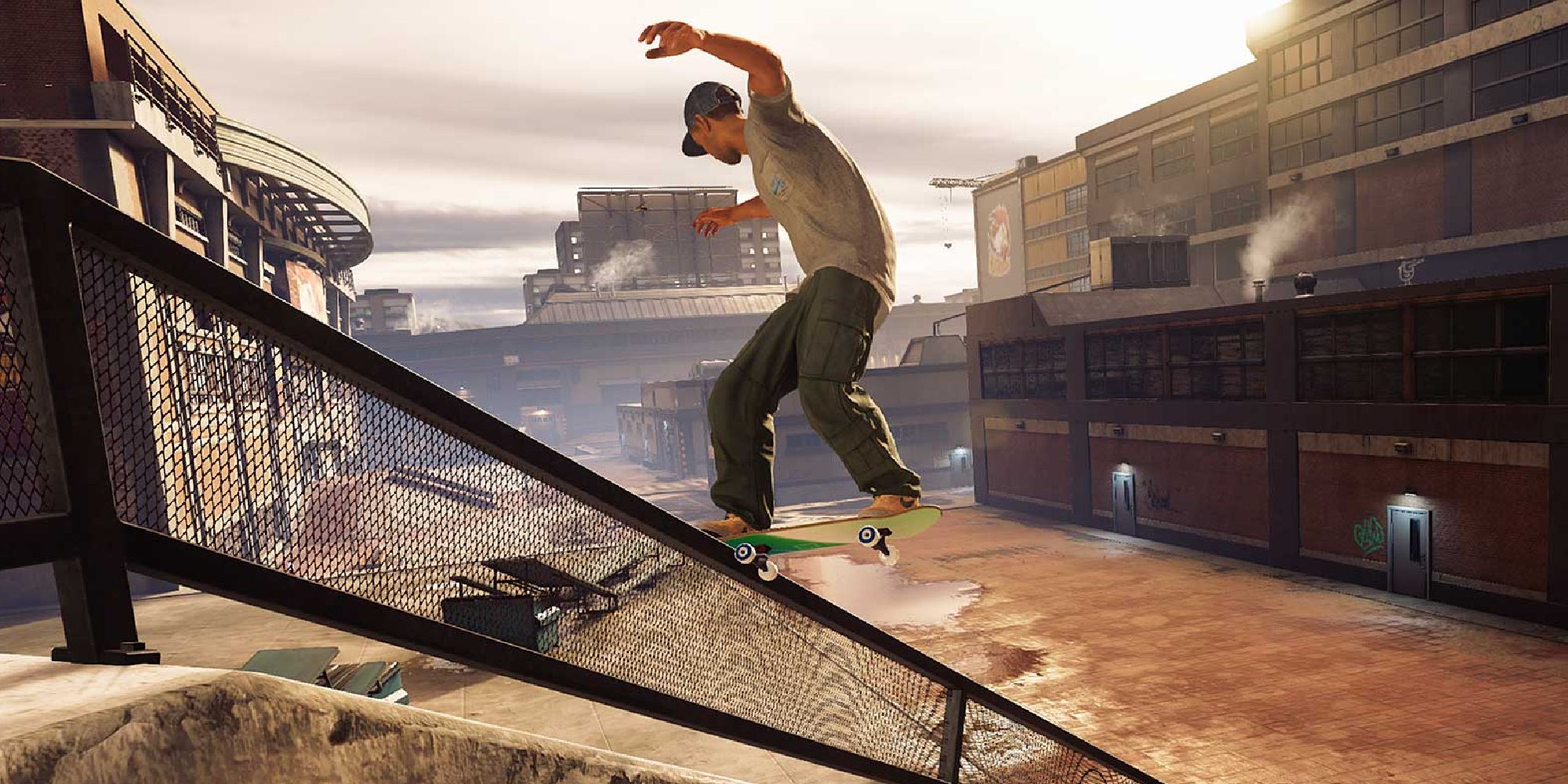 A skater riding down a railing near an abandoned warehouse in Tony Hawk's Pro Skater remastered edition