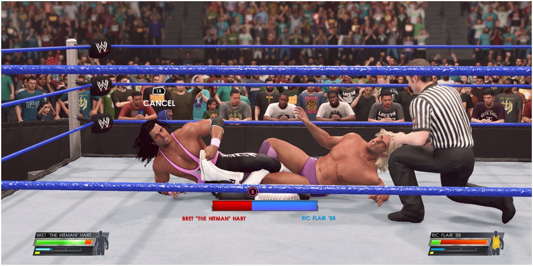 WWE-2K22-Bret-gets-the-Figure-Four-on-Flair-1
