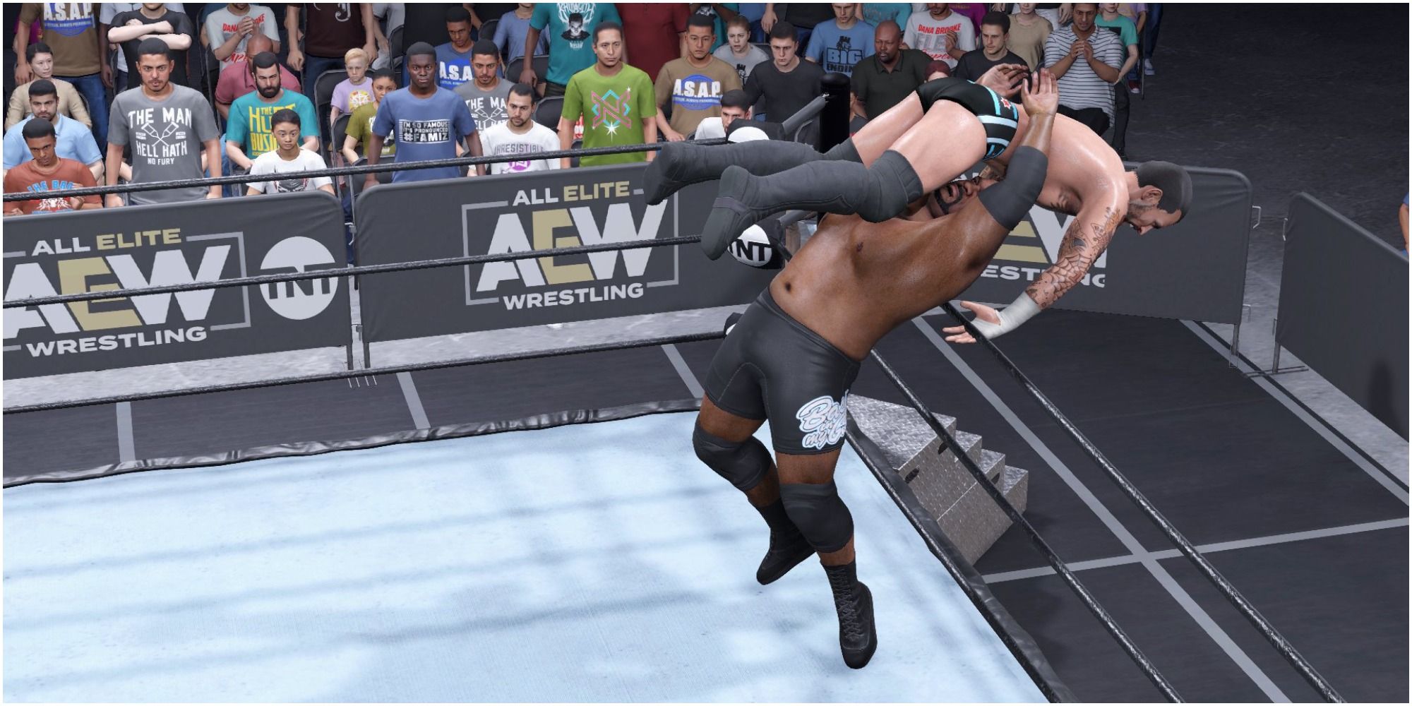 WWE 2K22 Keith Lee suplexing CM Punk out of the ring