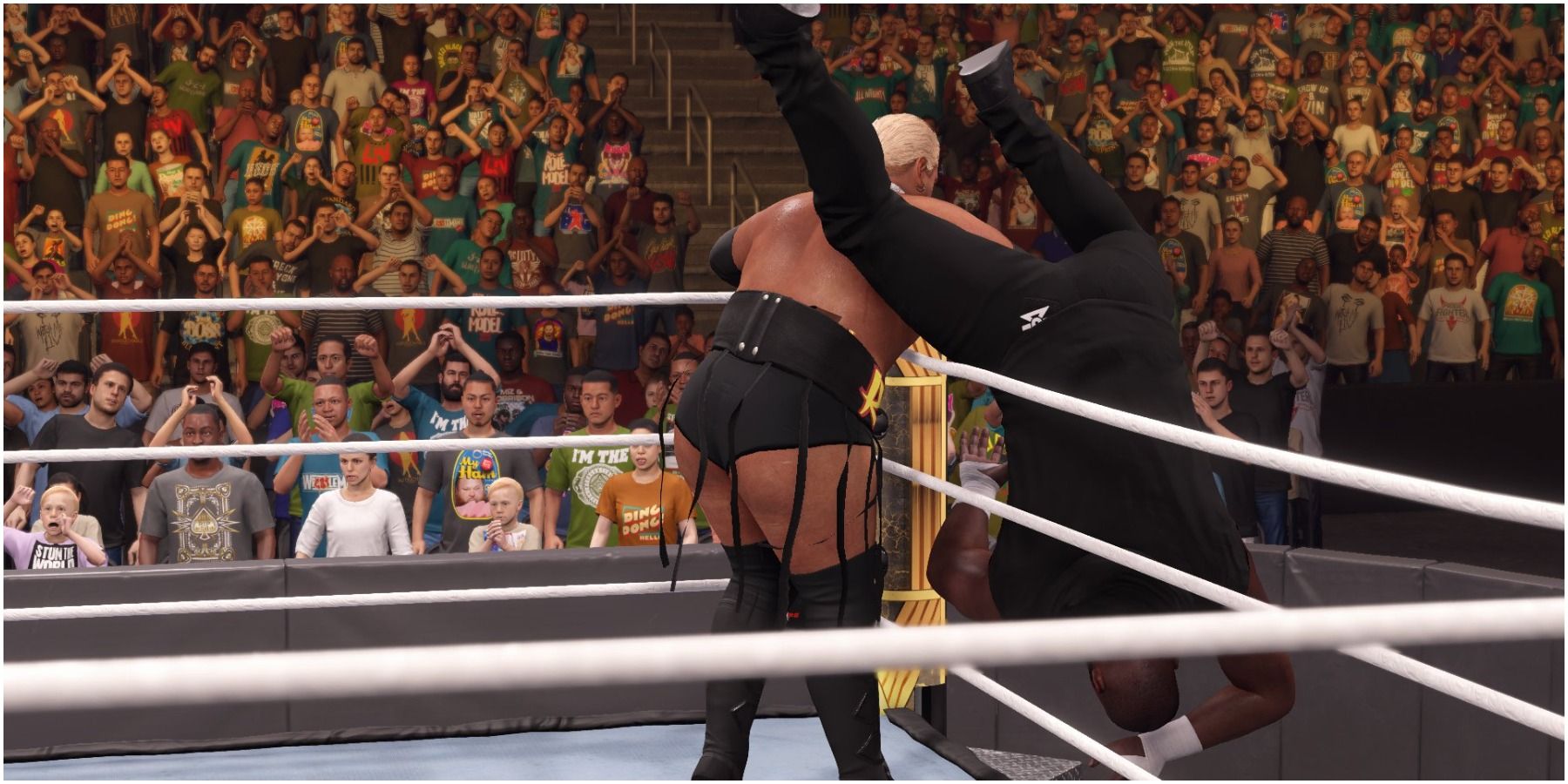 WWE 2K22 Rikishi clotheslines Omas to the outside