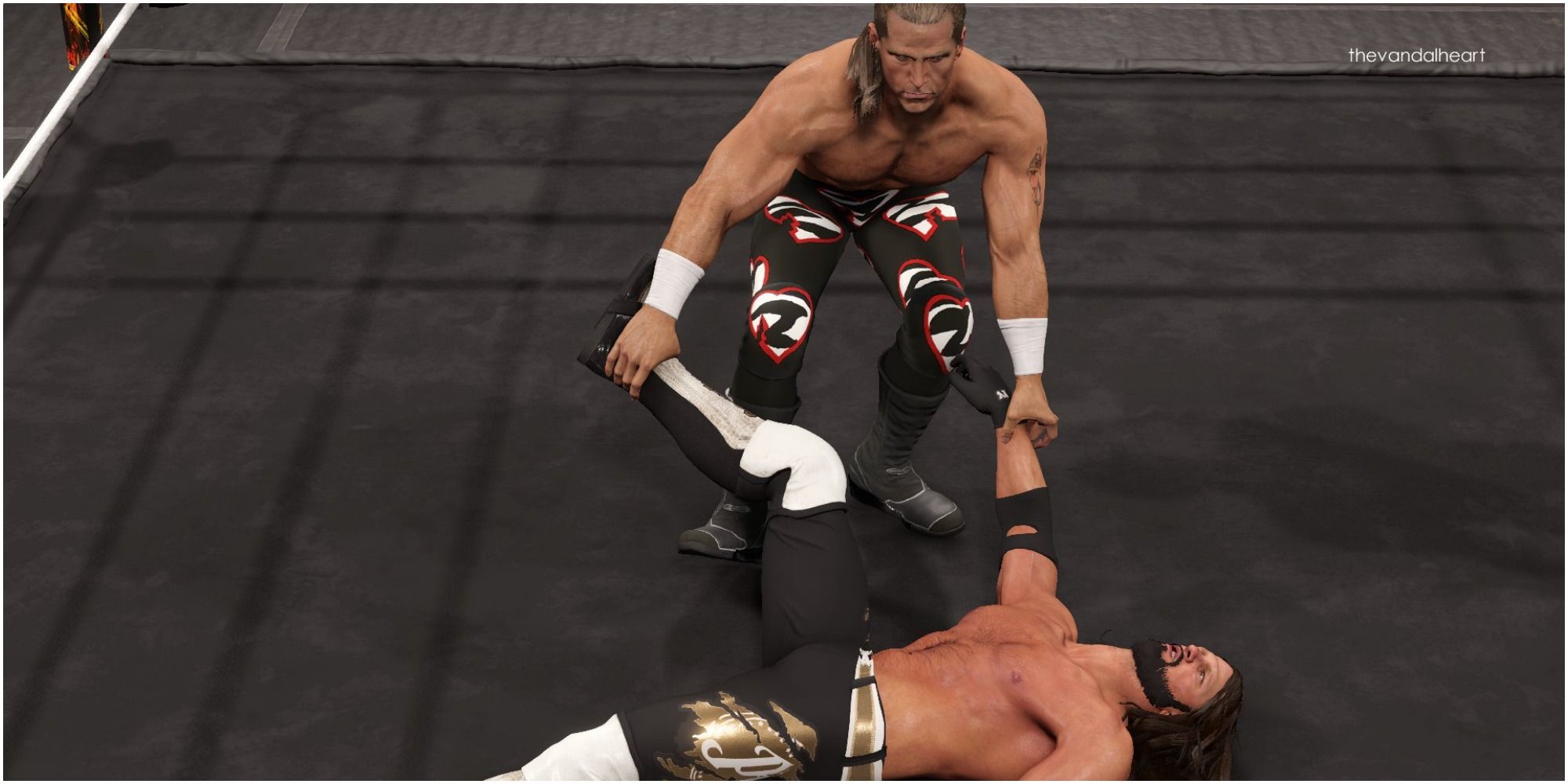 WWE 2K22 Shawn Michaels dragging a downed AJ