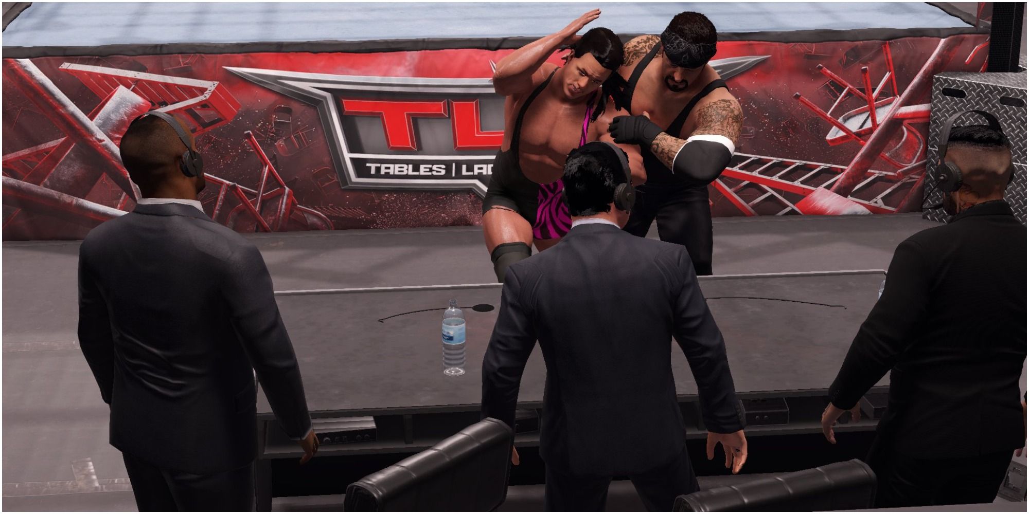 WWE 2K22 Undertaker slamming Steiner's head into announcer's table