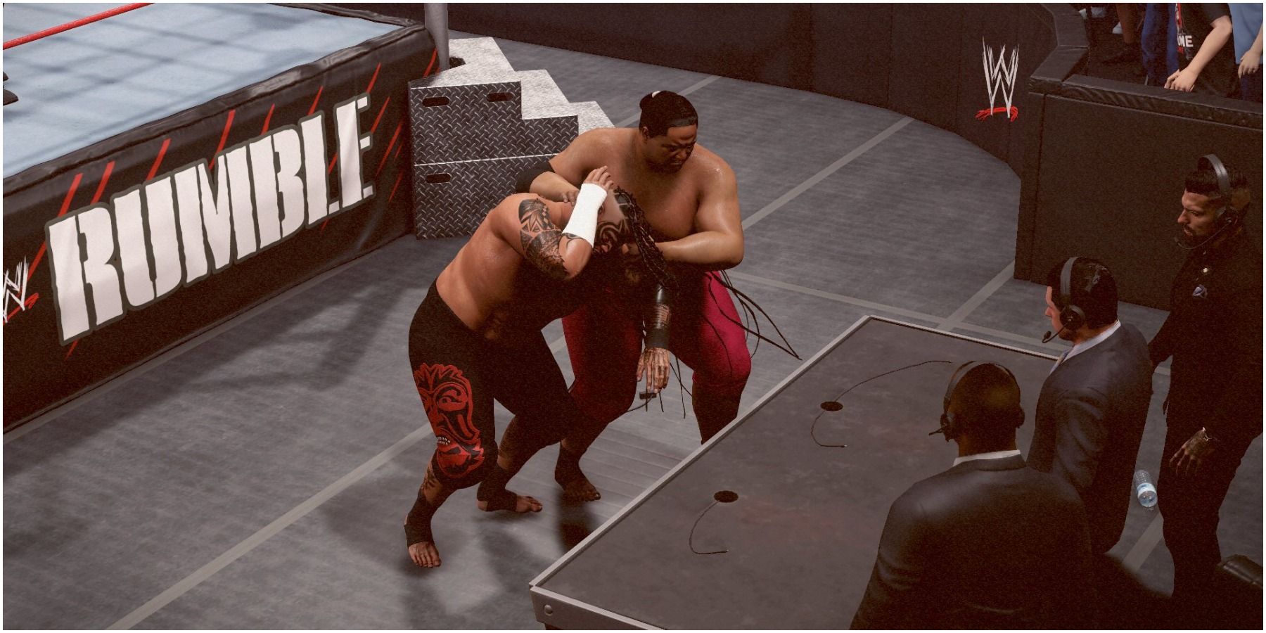 WWE 2K22 Yokozuna walks Umaga to the table