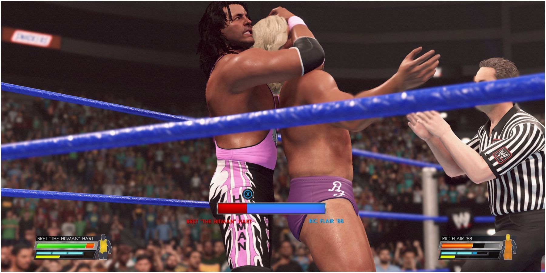 WWE 2k22 Bret Hart hits a sleeper hold on Flair