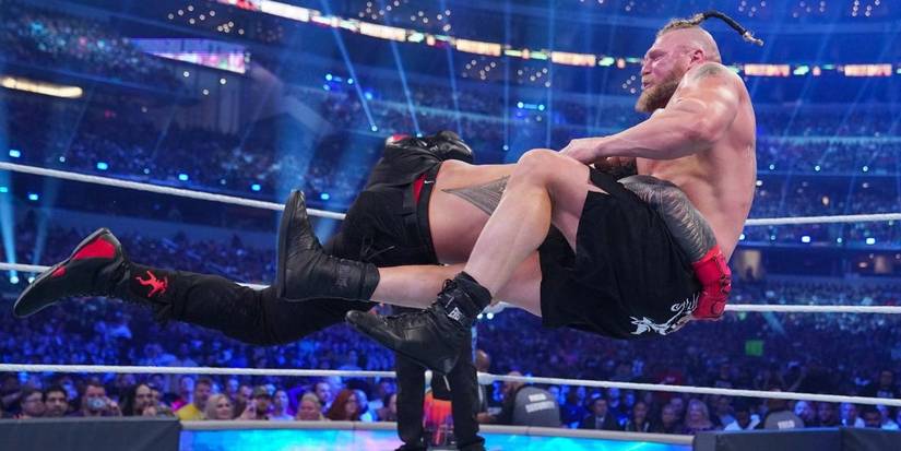 WWE Wrestlemania 38 Roman Reigns spears Brock Lesnar