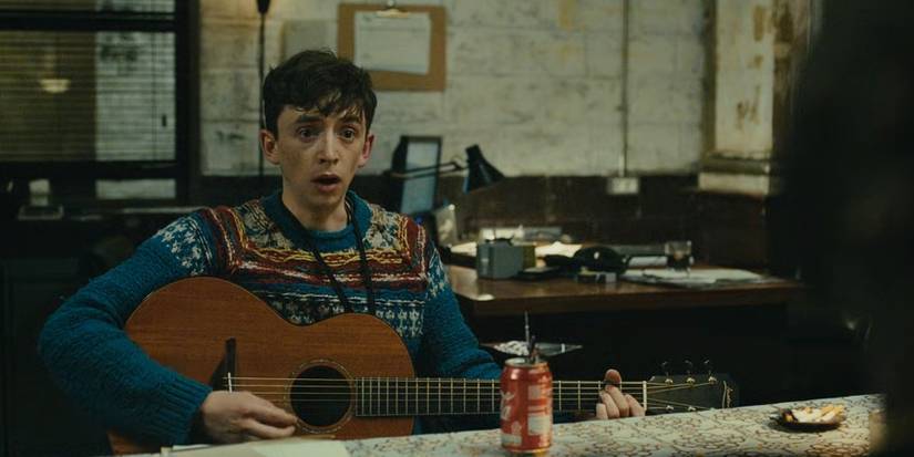 Wiley singing with guitar in Atlanta Samuel Blenkin