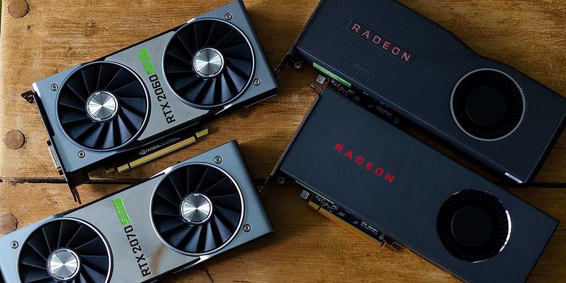 A photo showing two Nvidia RTX 20-series cards next to two AMD Radeon cards.