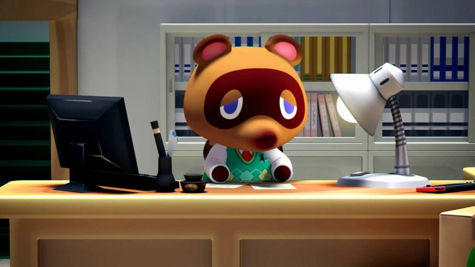 animal crossing new horizons tom nook on desk