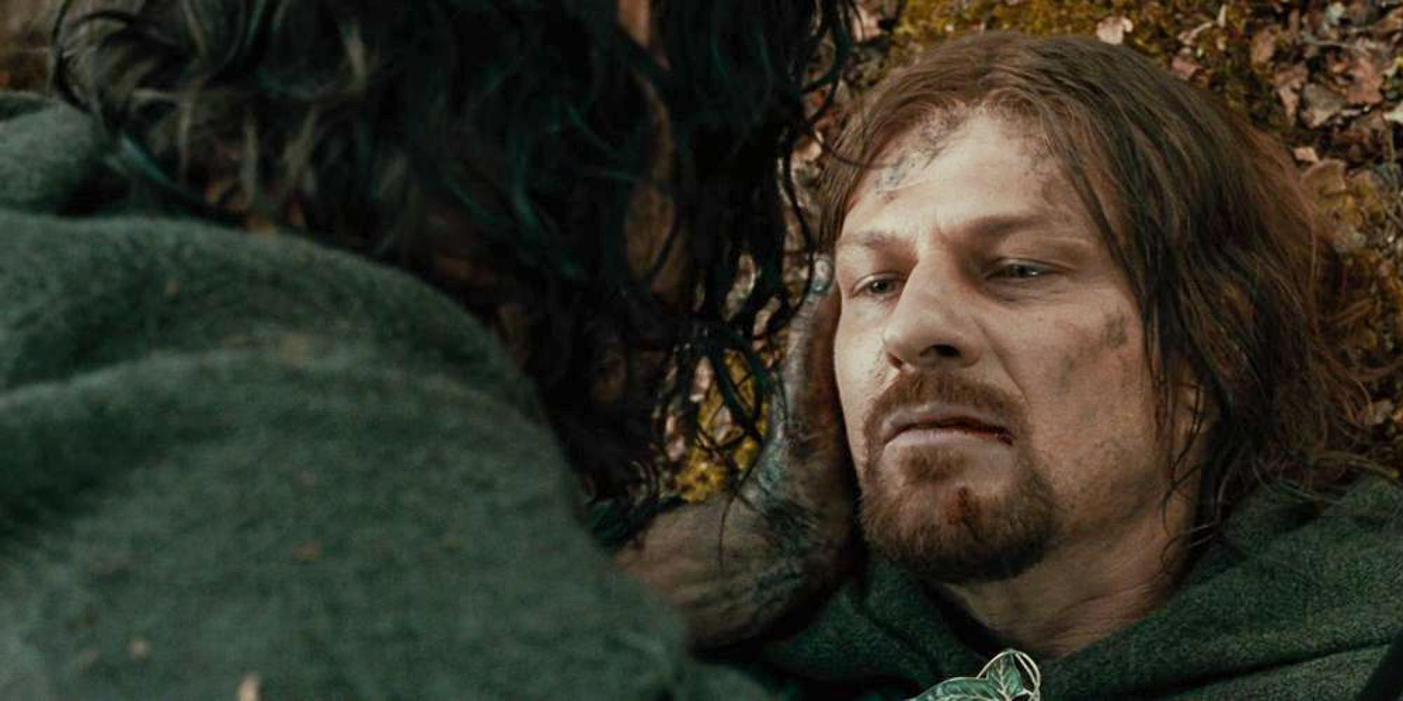 Aragorn holds a fatally wounded Boromir
