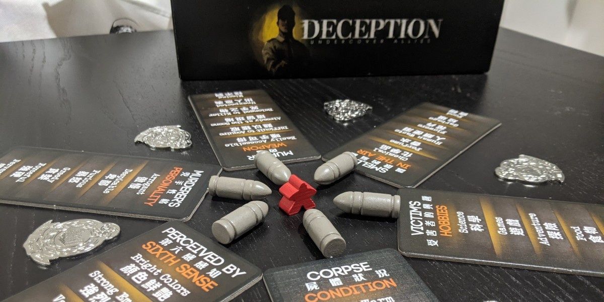 Deception game showing components and nice badges
