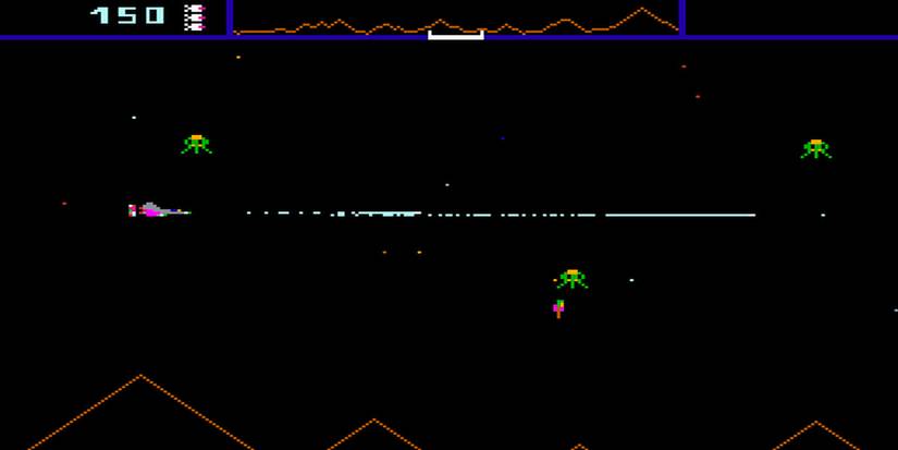 Player shooting at green ships in Defender