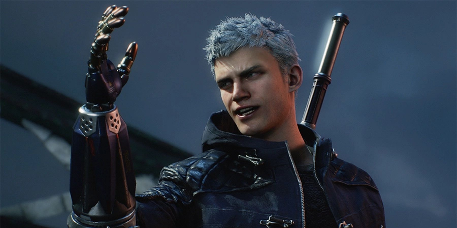 Nero from Devil May Cry 5 holding up his metal arm.