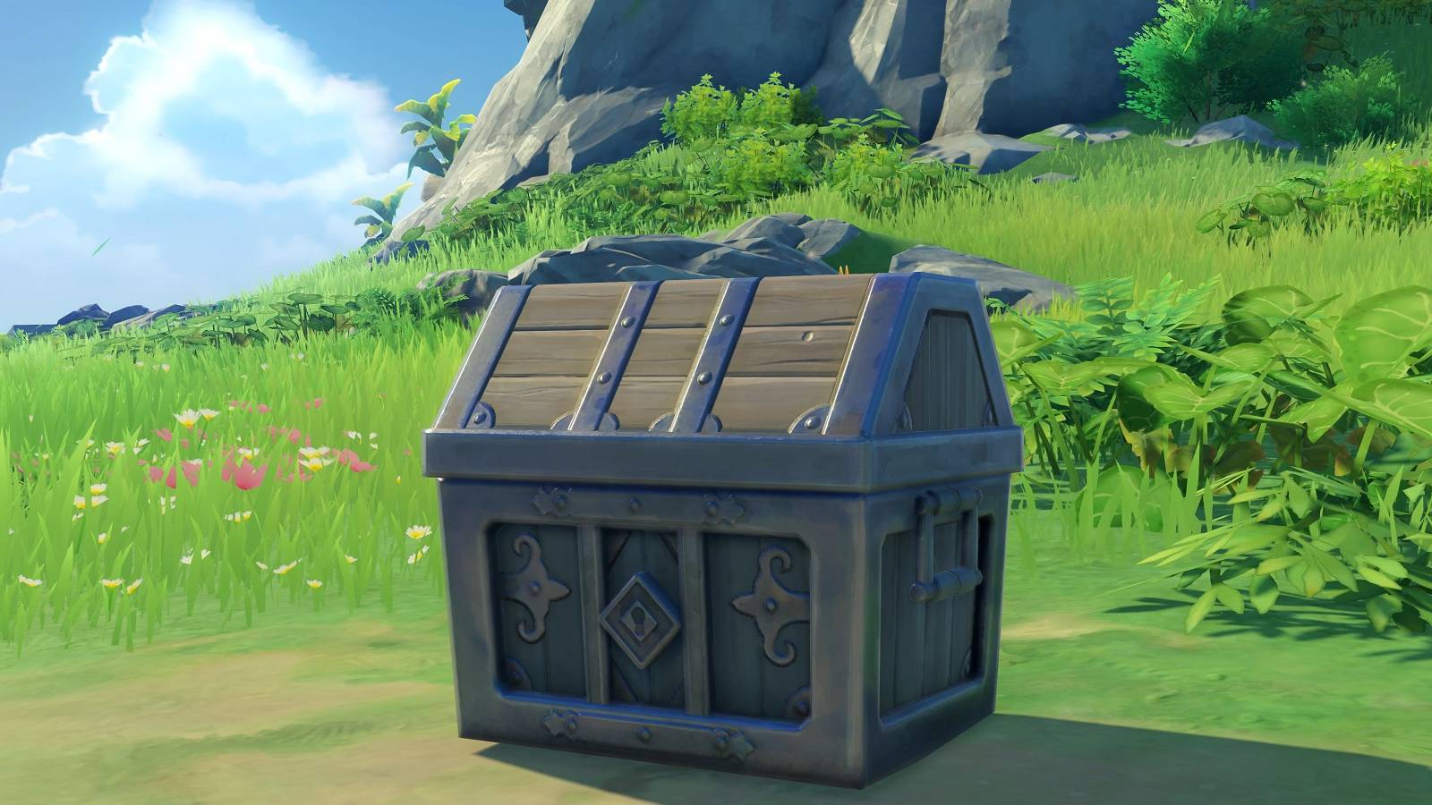 An exquisite chest from Genshin Impact sitting on a grassy landscape.