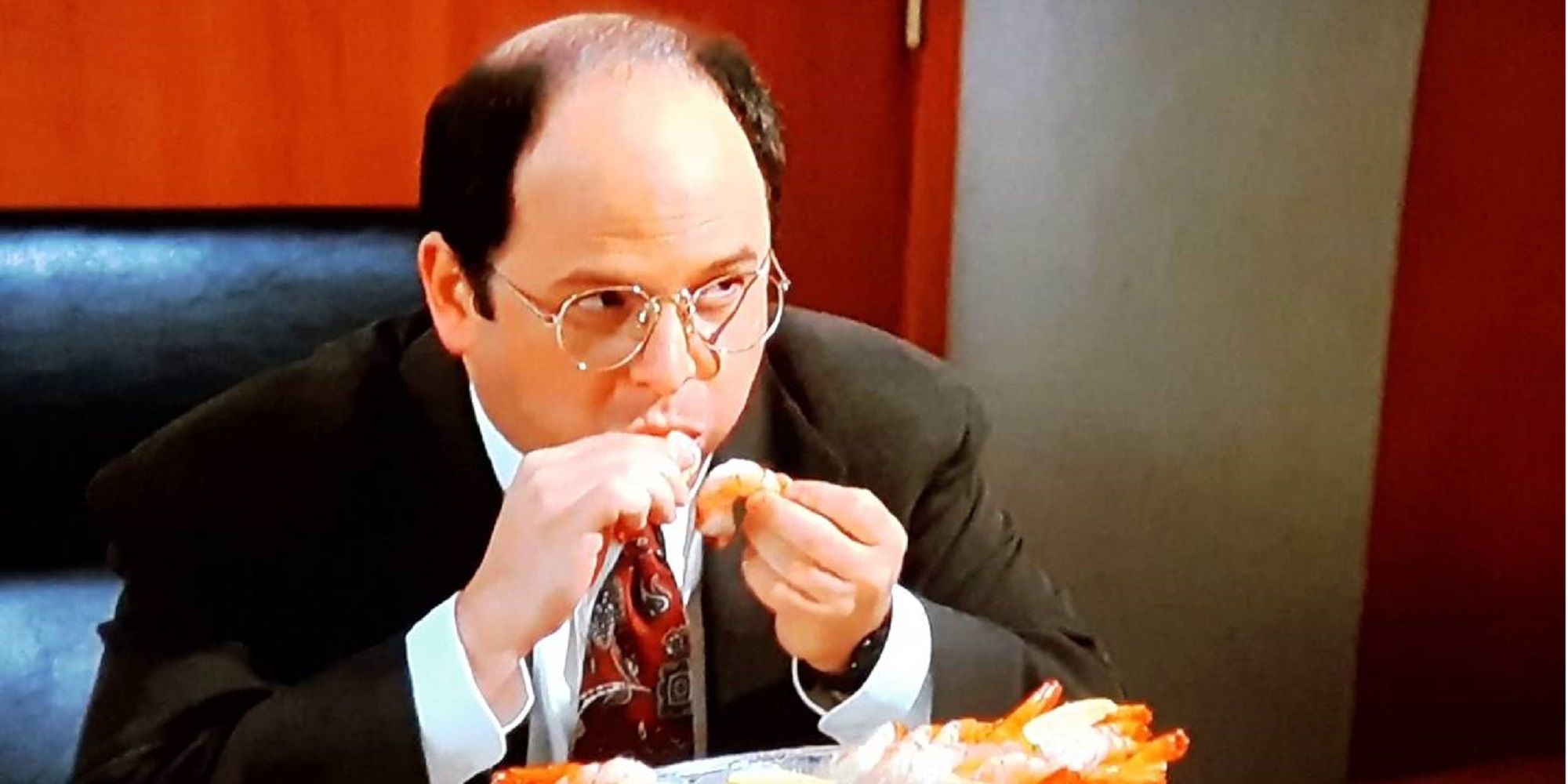 george eating shrimp