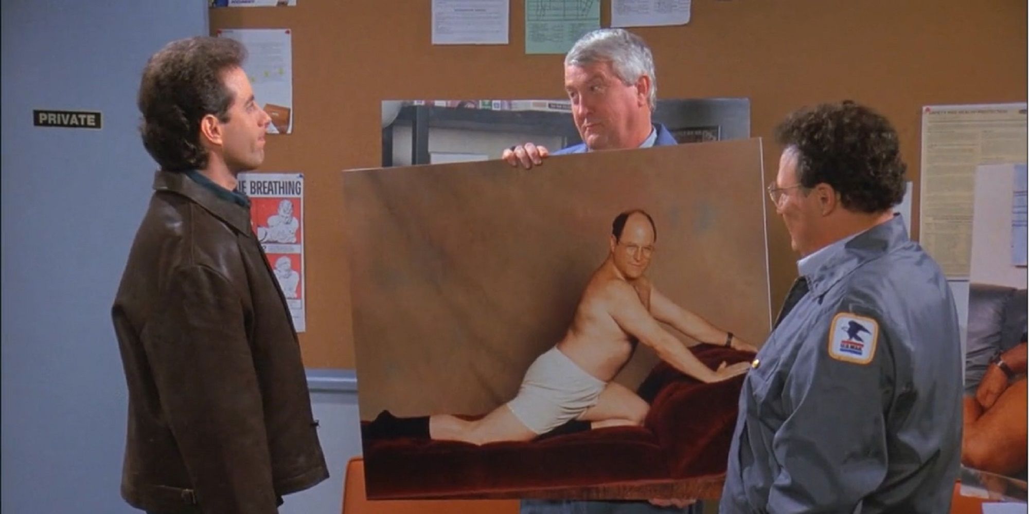 jerry and newman looking at george photo