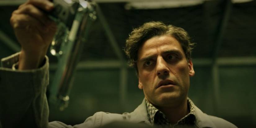 Steven Grant with gun Oscar Isaac