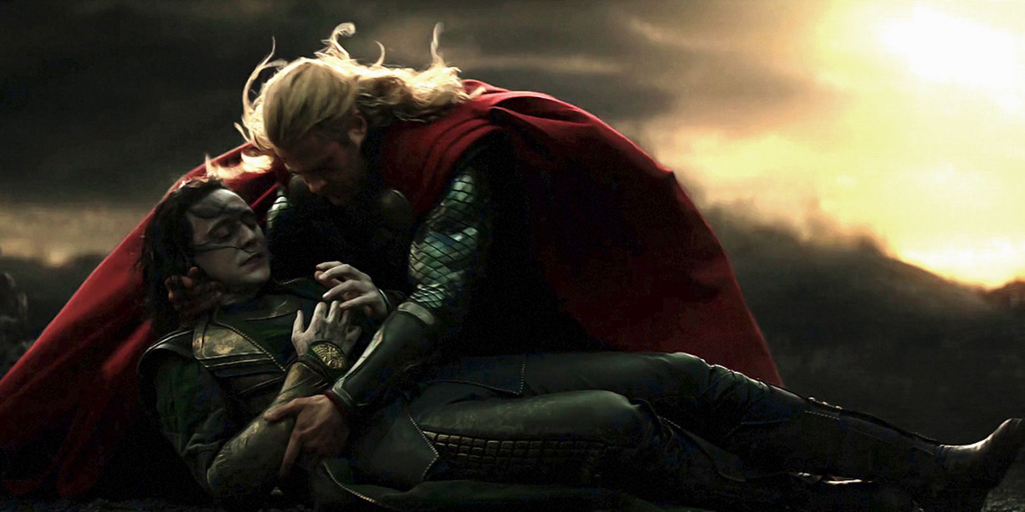 Thor holds a fatally wounded Loki