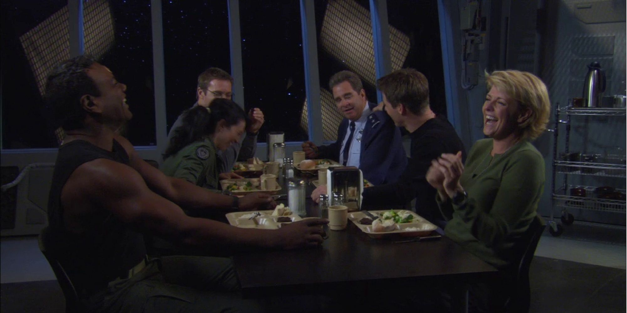 main cast having dinner in the last episode