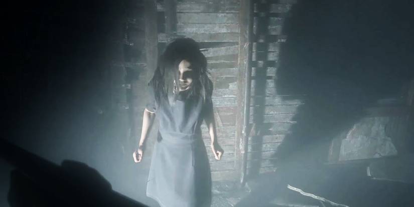 Ethan fighting Eveline Resident Evil 7