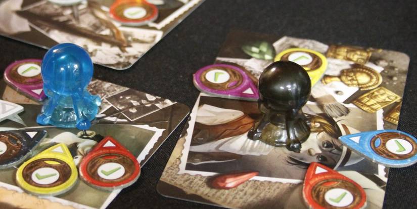 mysterium game showing players betting on the culprit and clues