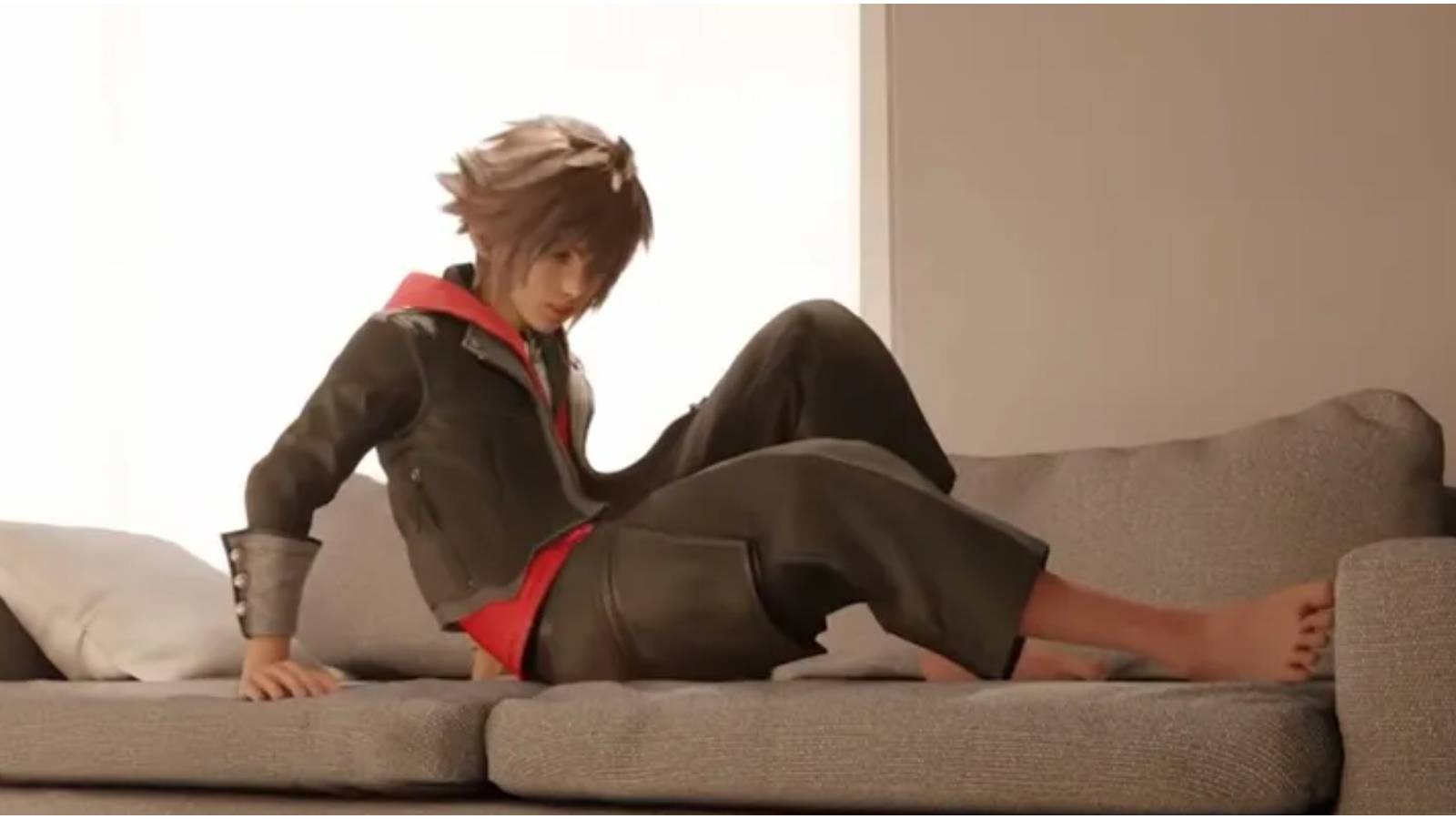 Sora on couch in trailer. 