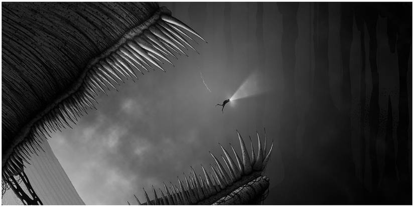 Diver swimming away from giant mouth in Silt