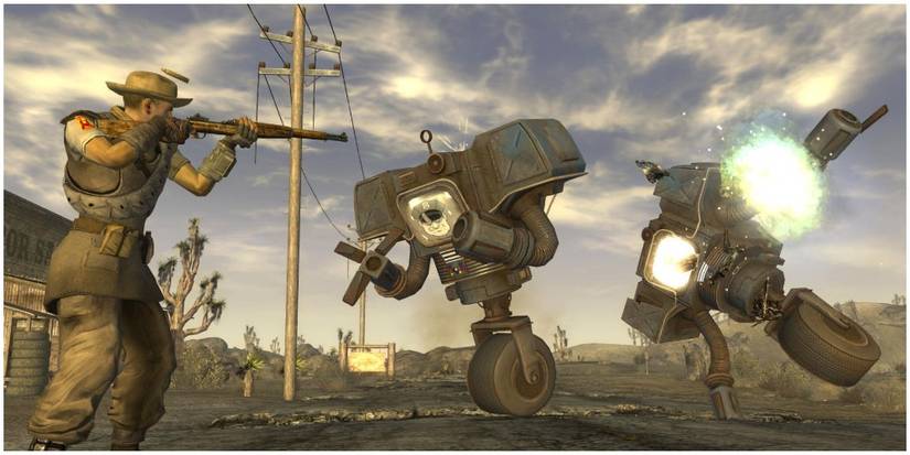 Man shooting robots. 