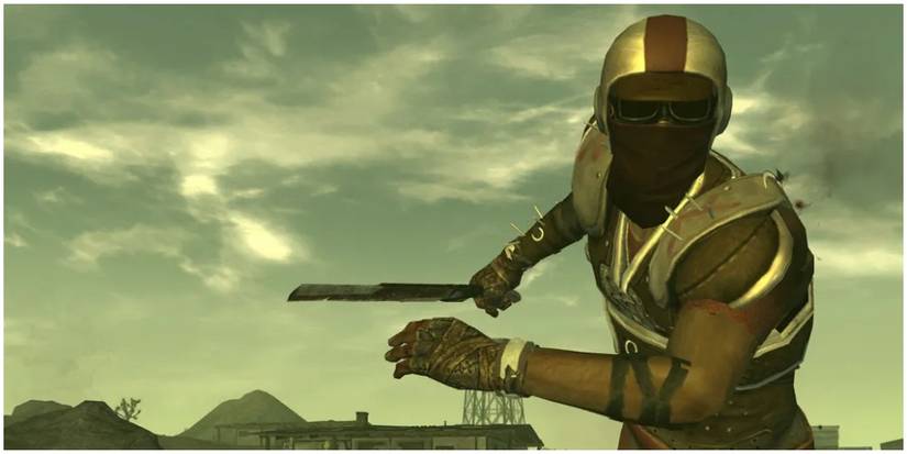 Man charging with a machete. 