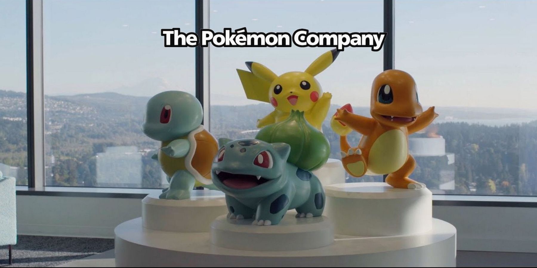 pokemon-company-logo-statue-starters-kanto