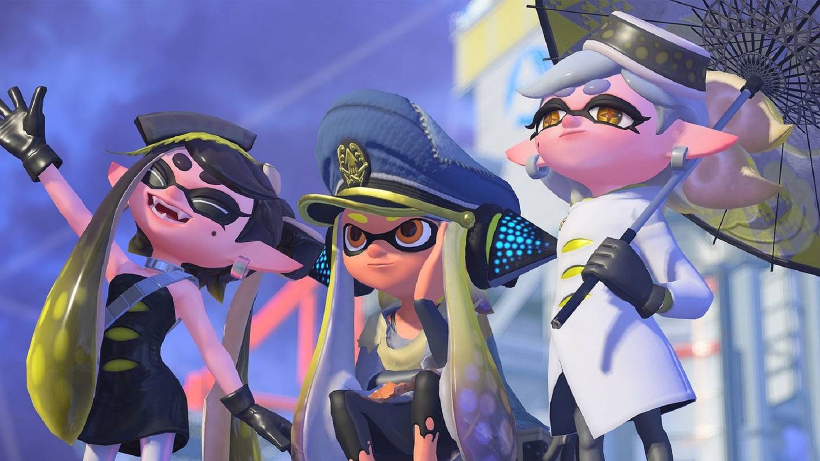 The squid sisters standing on either side of an inkling from Splatoon 3.