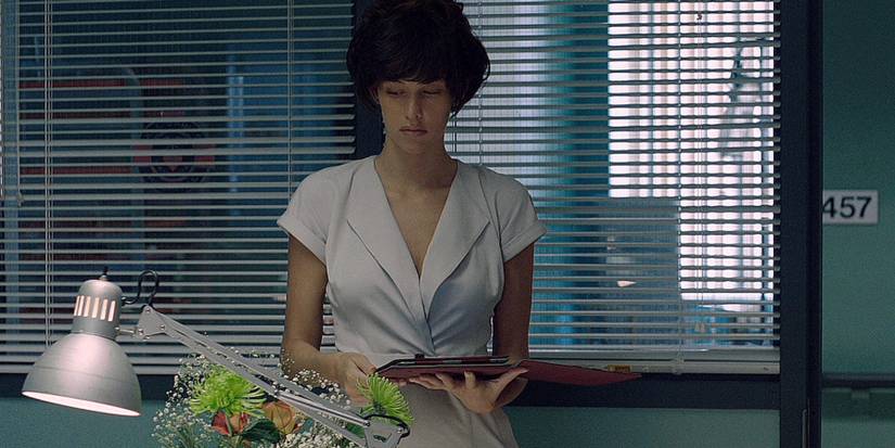 Abby Russell looking at a clipboard