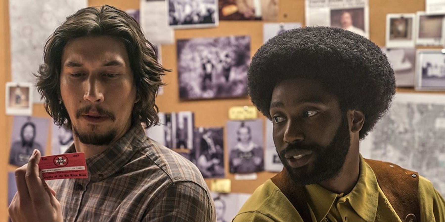 Adam Driver as Detective Philip "Flip" Zimmerman and John David Washington as Detective Ron Stallworth in Blackkklansman