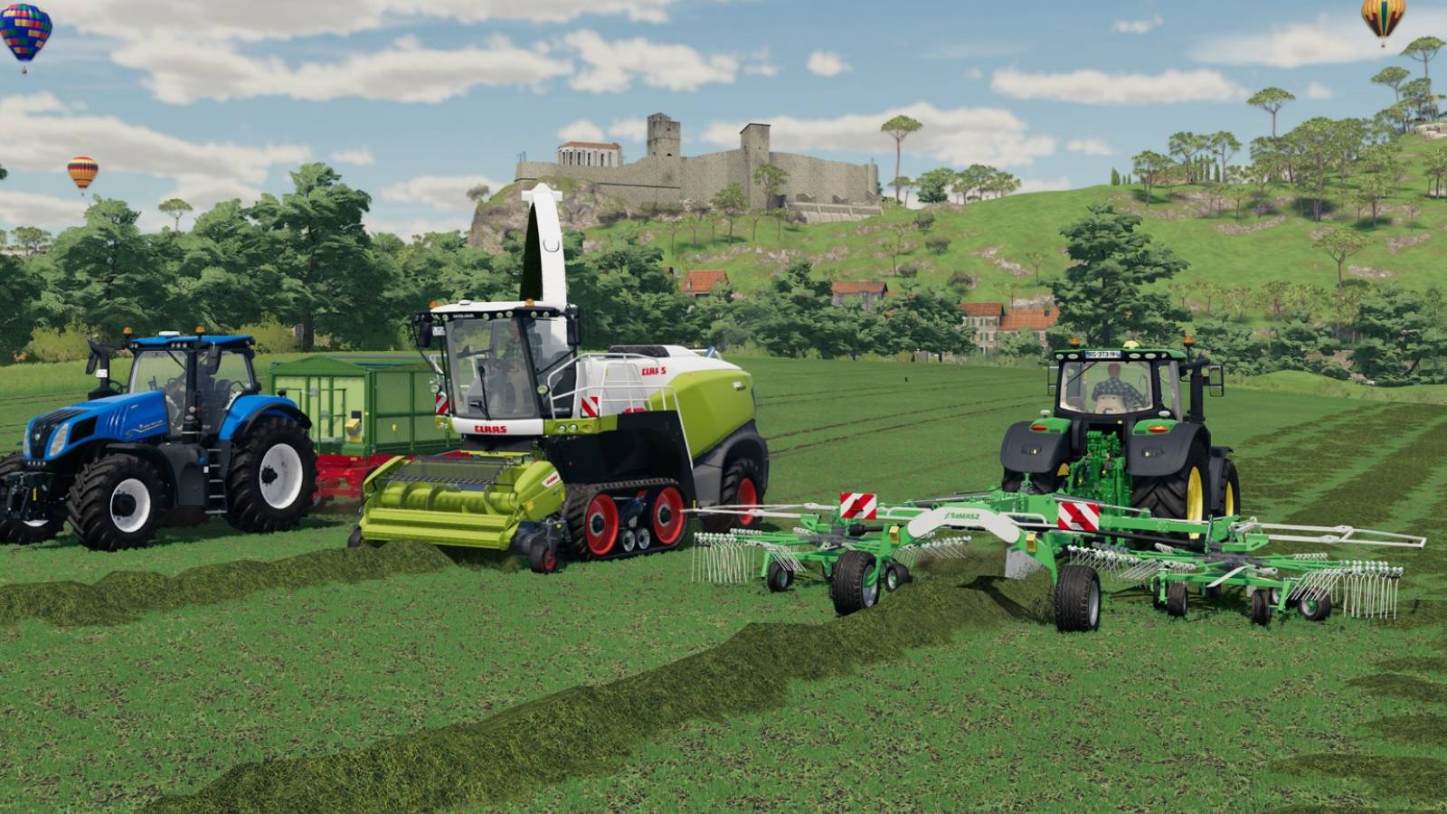 Three tractors collecting crops