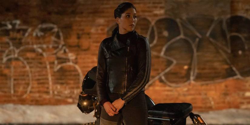 Alaqua Cox as Echo next to bike in Hawkeye