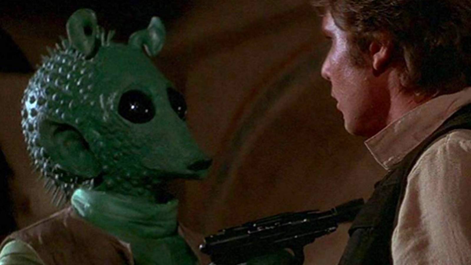 Greedo attacking Hans Solo in Star Wars