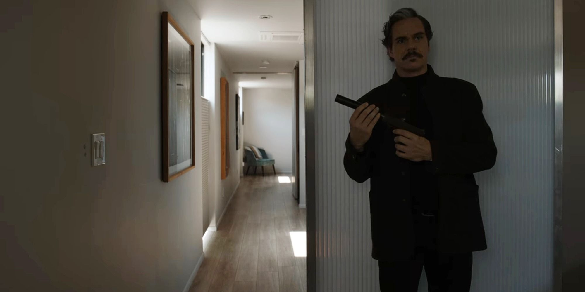 Lalo Salamanca with silenced gun inside house Better Call Saul