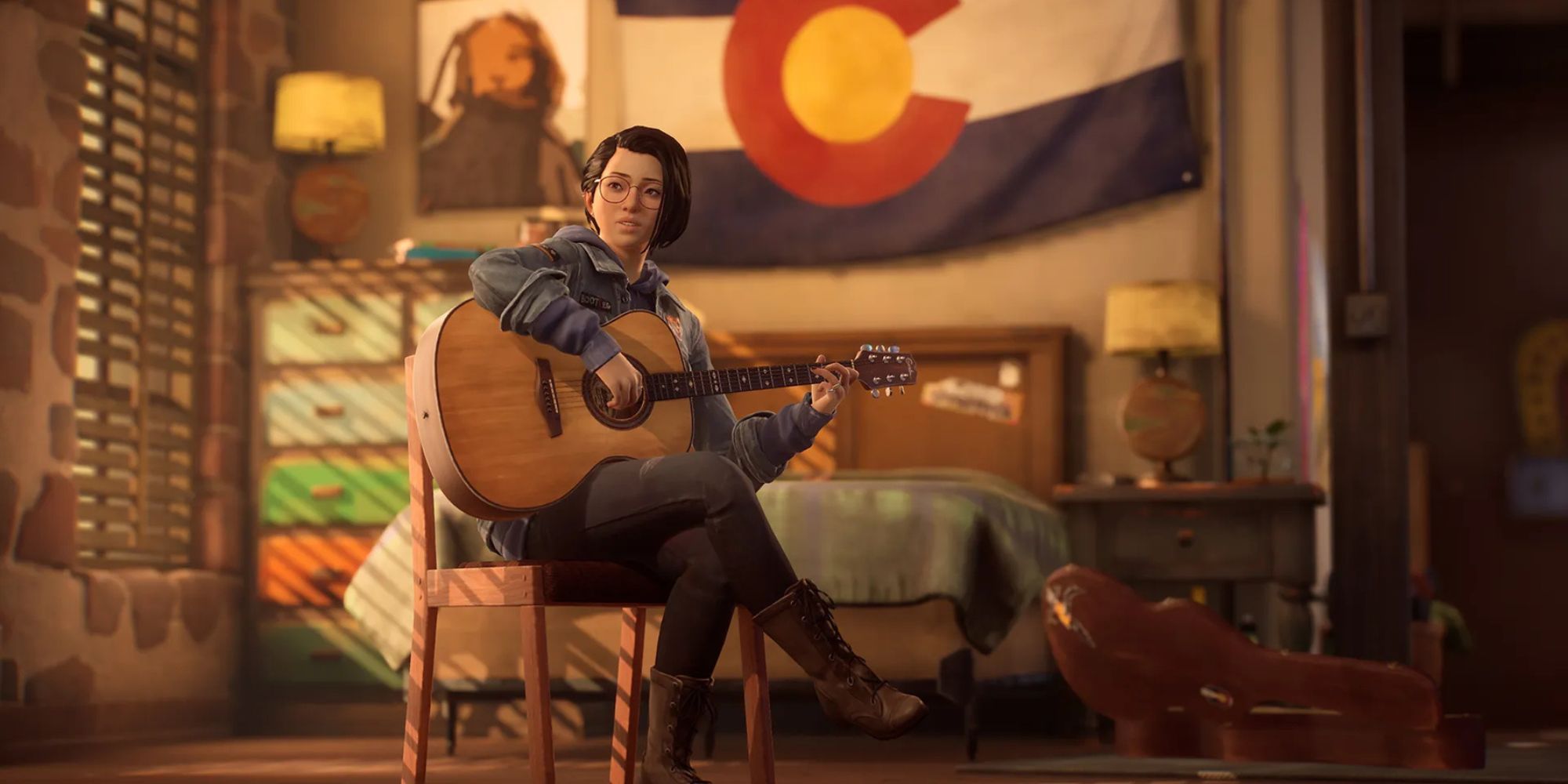 Alex Chen, the protagonist of Life is Strange: True Colors holding a guitar in an emotional scene